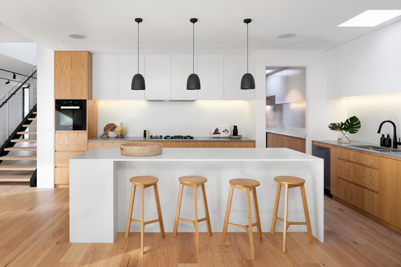 A bright, modern open-plan kitchen and living space.